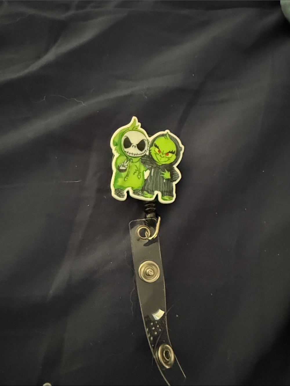 Green Cartoon Character Badge Reel - Unbranded